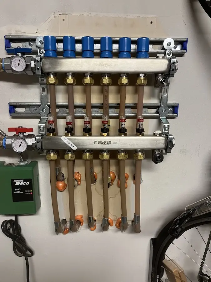 Plumber performing Gas Leak Detection at a residential property in Ho-Ho-Kus